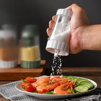 Изразете солонка Домакински пластмасова банка за подправки Влага солонка кухненски приспособления Бутилка за подправки притискателния тип